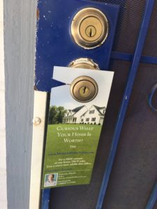 What is your home worth door hanger or door. 