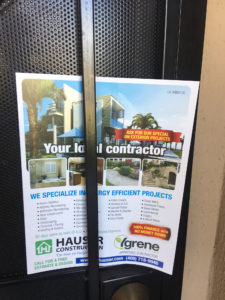 ADU Home Construction Flyer on the front door.