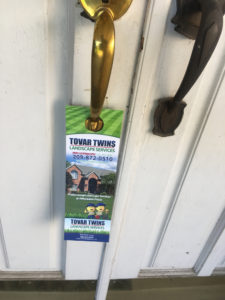 Landscaping Door hanger on the front door.